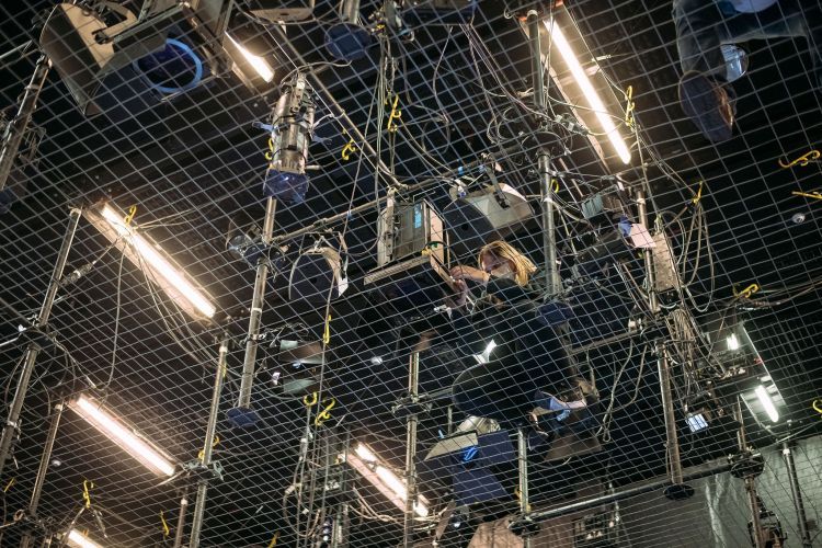 Production Arts student working on the tension wire grid